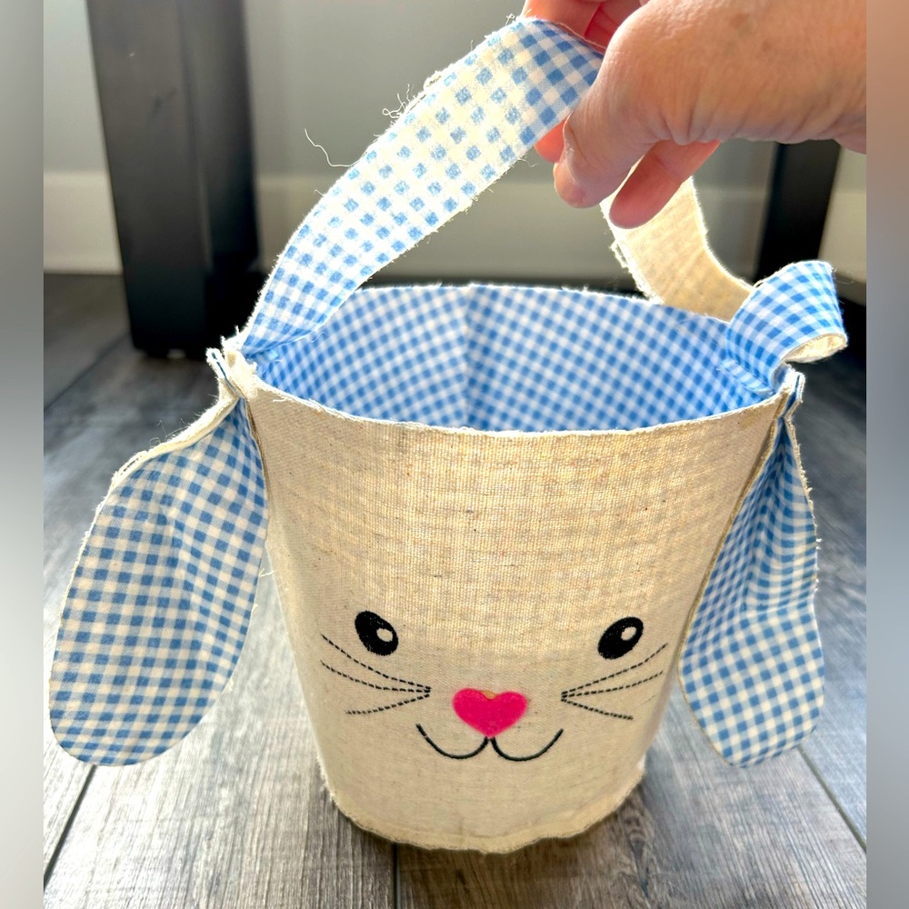 Cream colored cotton Easter basket with blue and white checkered ears and lining